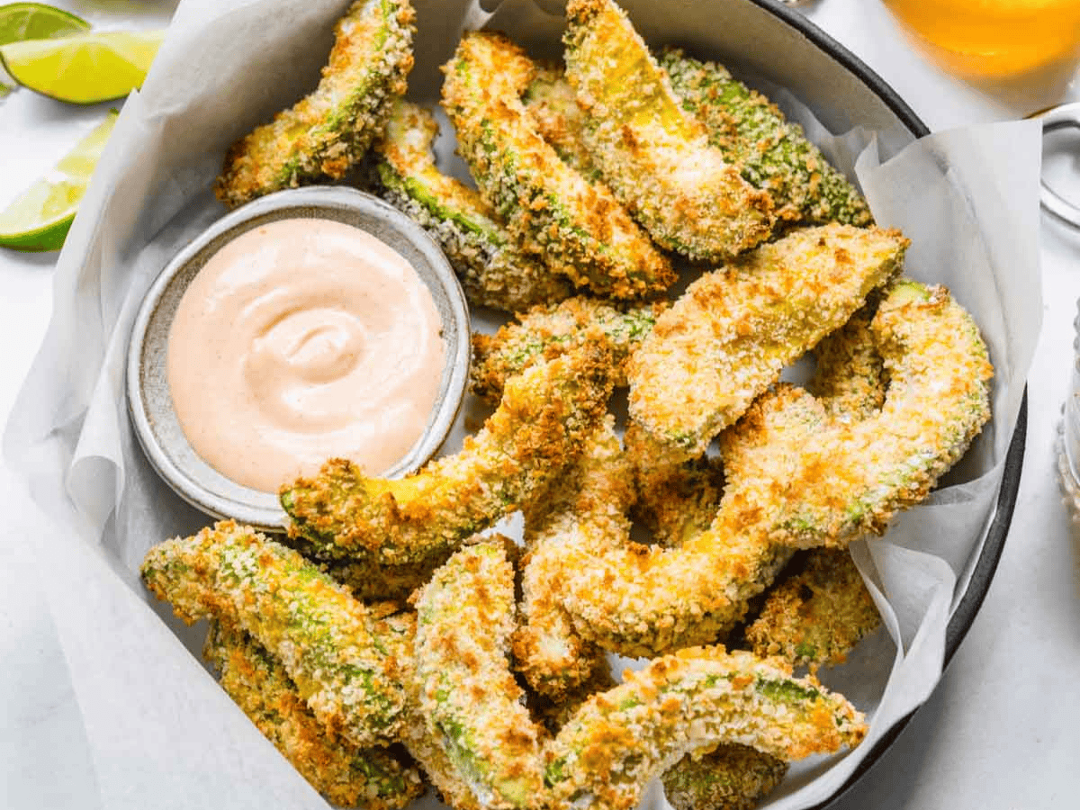 finished fries in a dish with fry sauce