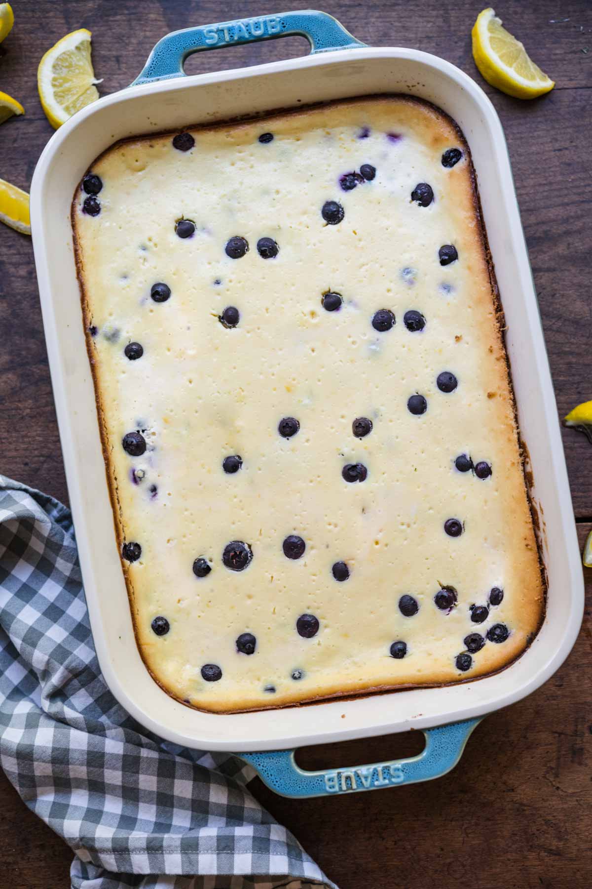 Blueberry Lemon Cheesecake Bars in baking dish after baking