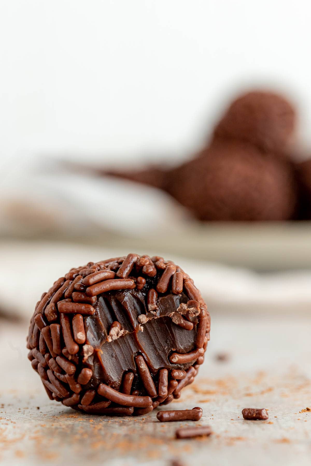 Brazilian Brigadeiros Candy piece with bite taken