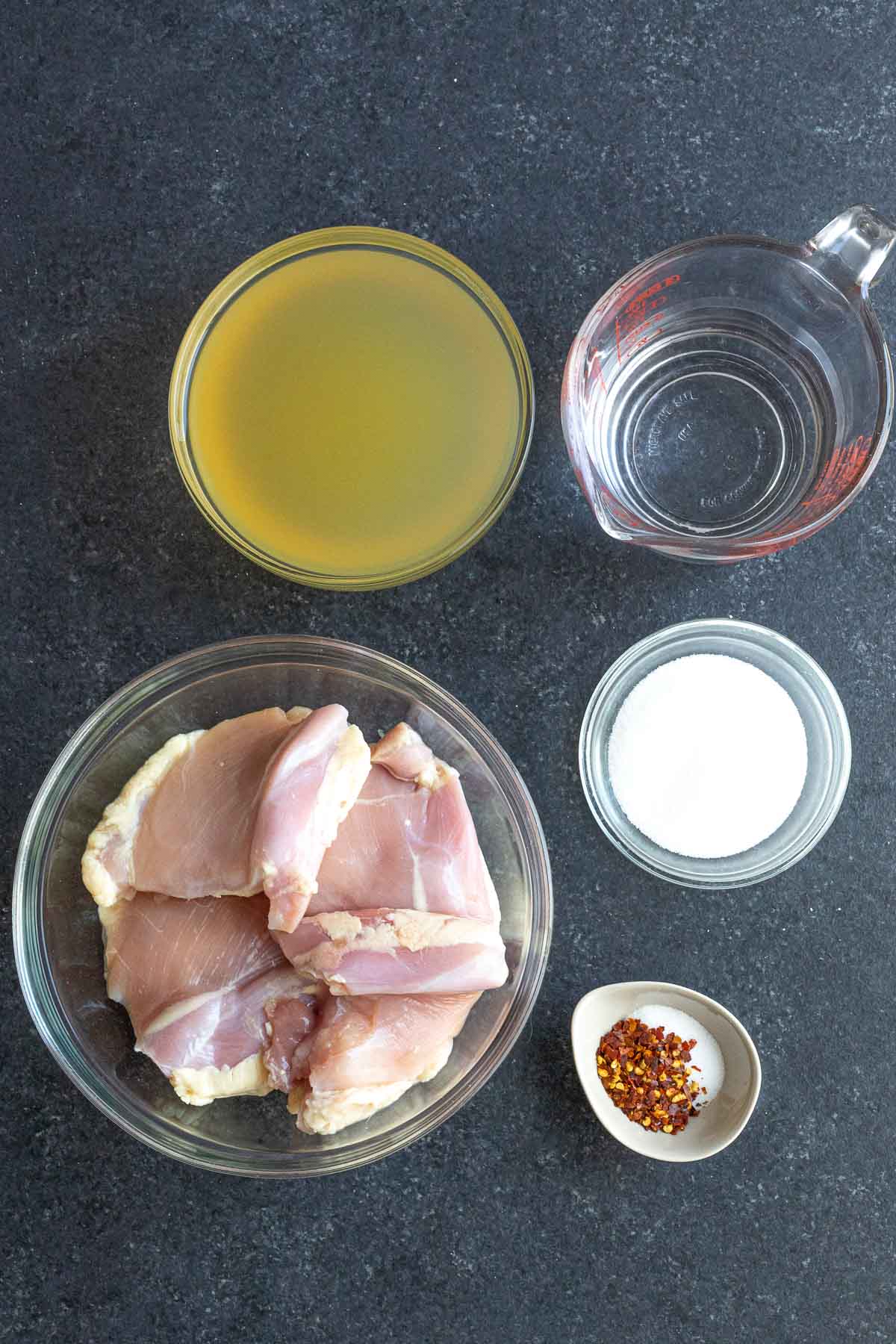 Ingredients for Carolina BBQ Vinegar Shredded Chicken in prep bowls