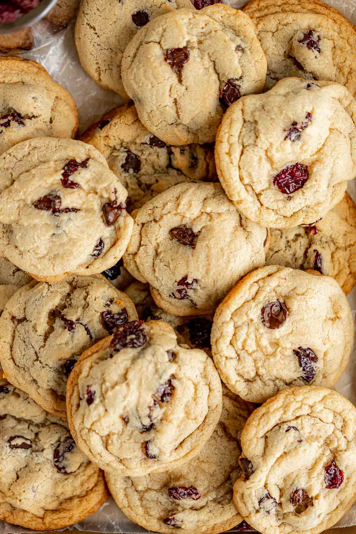 Cherry Chocolate Chunk Cookies in pile on cookie sheet