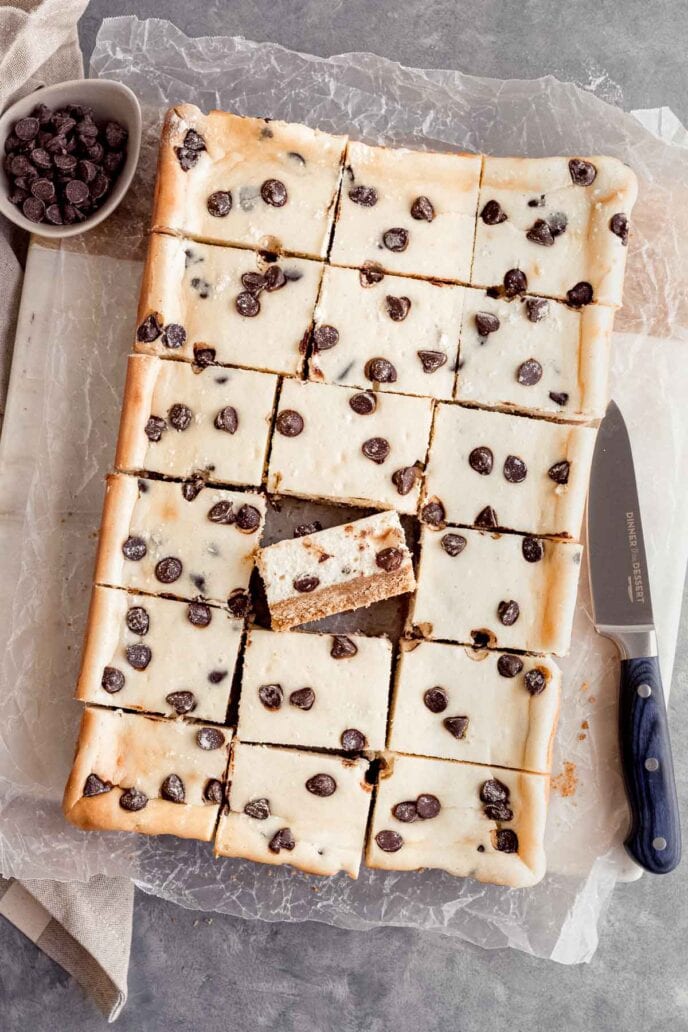 Close up of Chocolate Chip Cheesecake Bars on cutting board