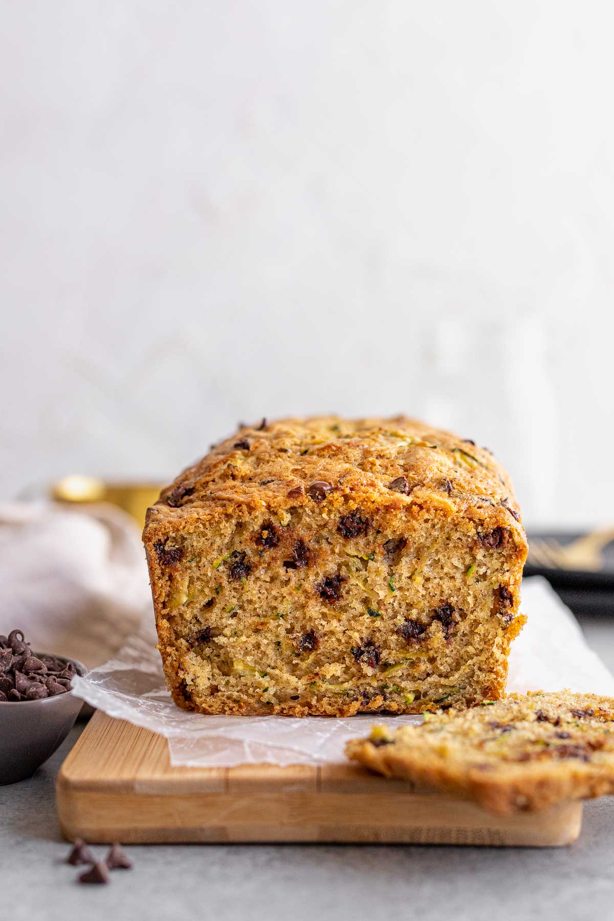 Chocolate Chip Zucchini Bread sliced loaf on cutting board