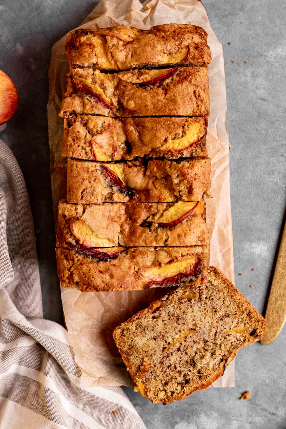 Cinnamon Peach Bread sliced on cutting board