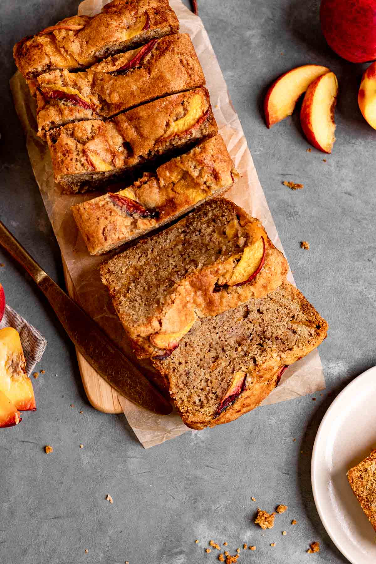 Cinnamon Peach Bread sliced on cutting board