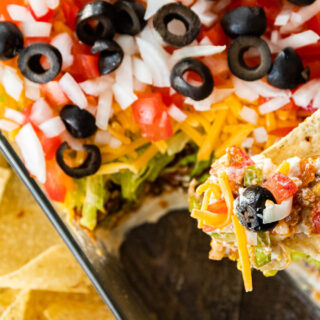 Taco Dip in pan served with tortilla chips 4x3