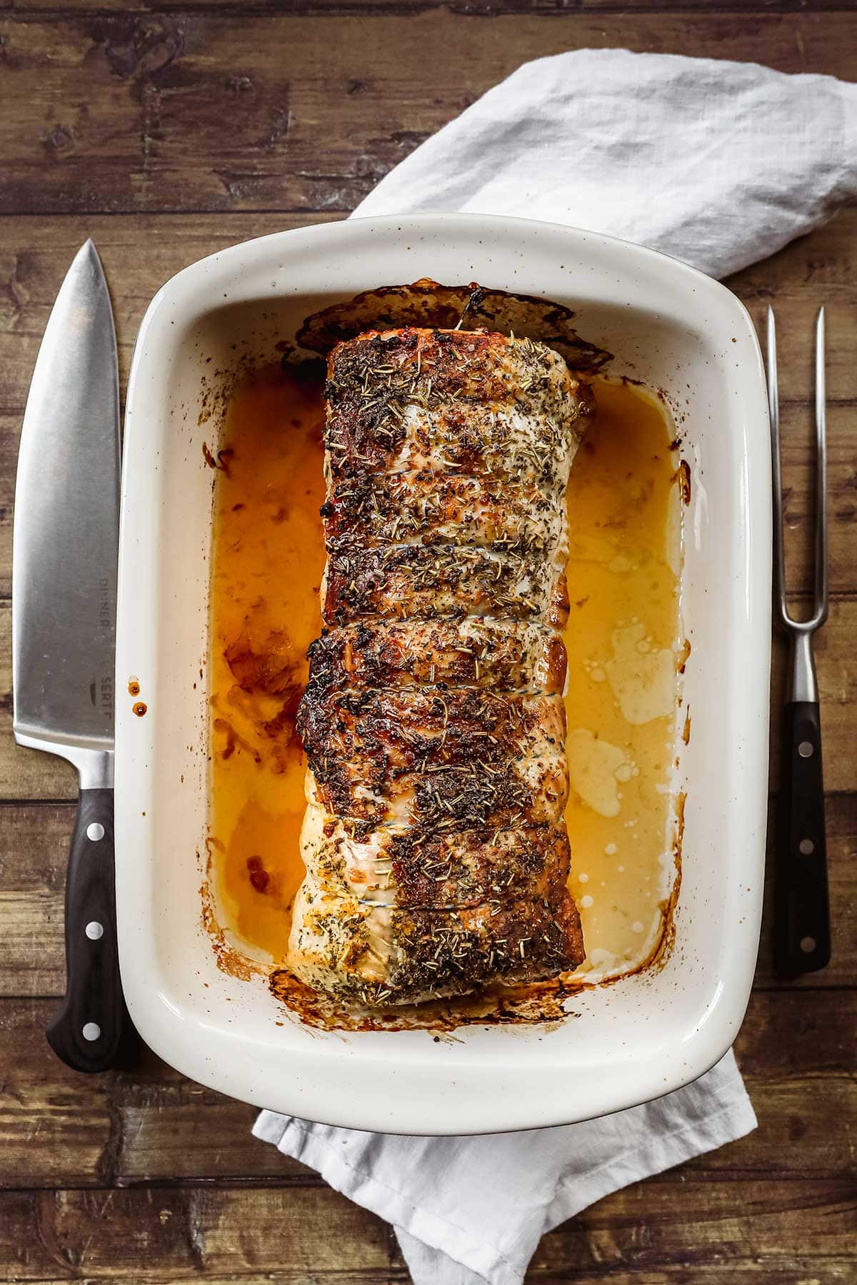 Herb Crusted Pork Loin in baking dish after baking