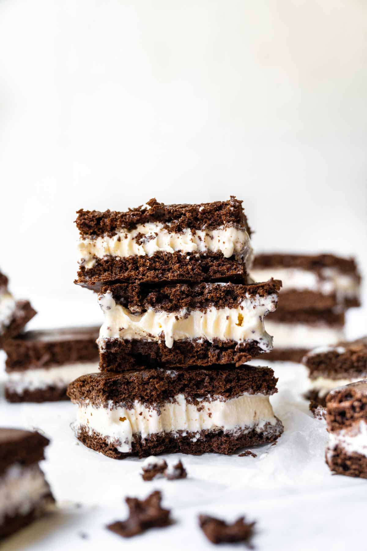 Ice Cream Sandwiches on parchment with bite taken