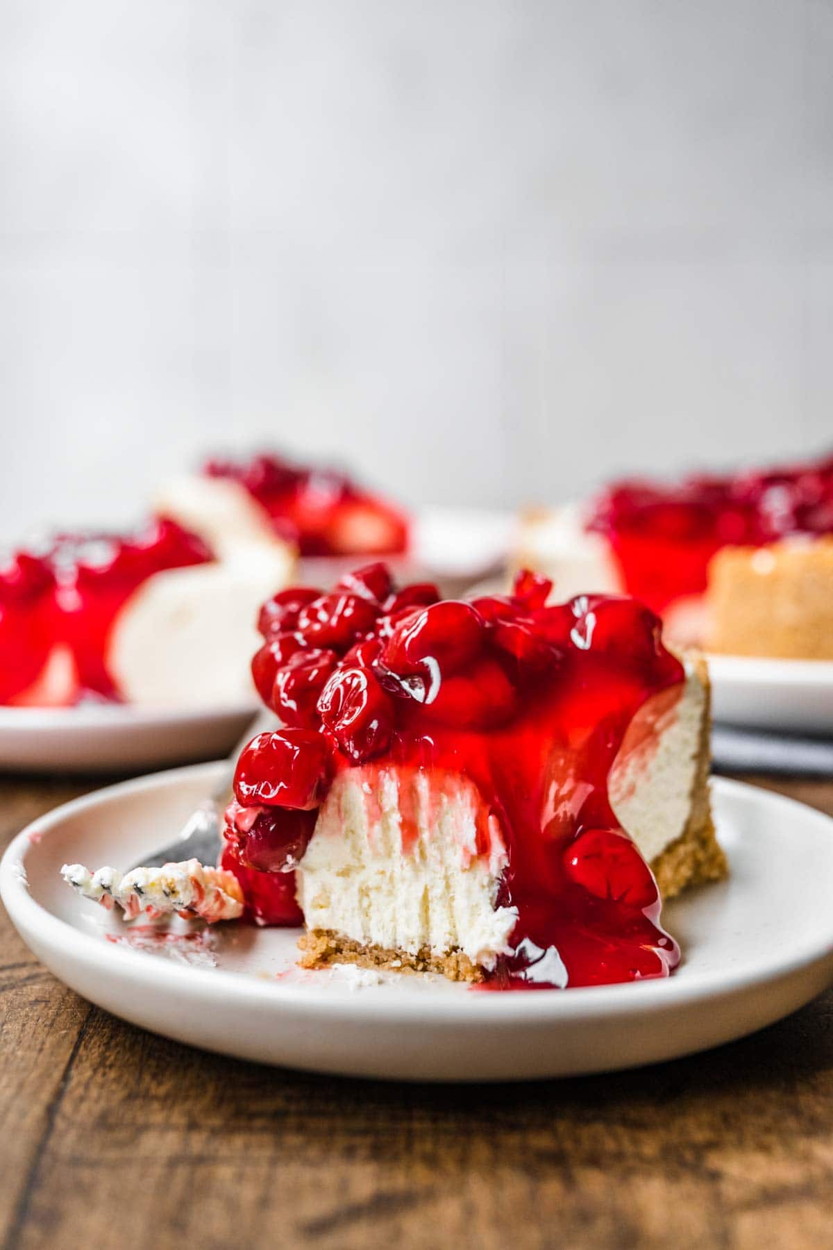 No Bake Cherry Cheesecake slice on plate