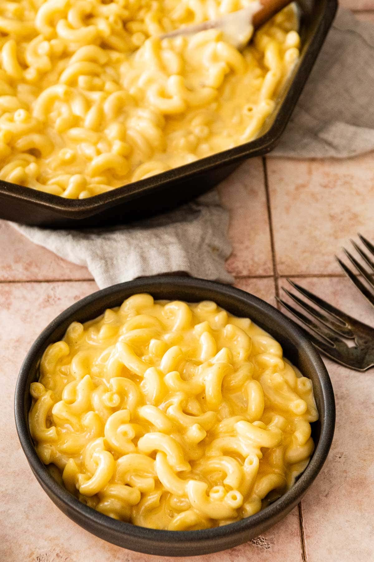 Skillet Creamy Mac and Cheese in bowl with fork