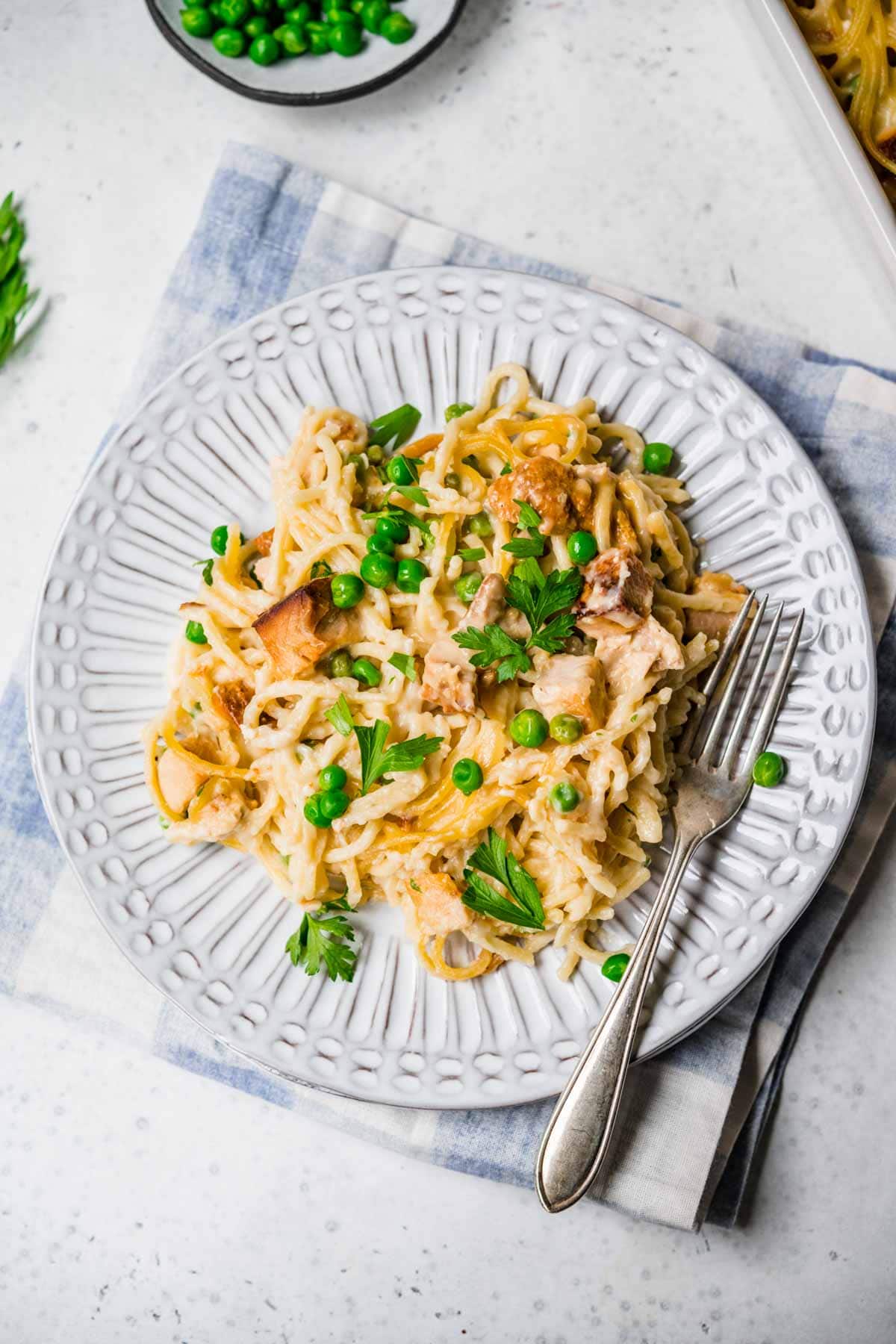 Turkey Tetrazzini on a plate with fresh parsley garnish