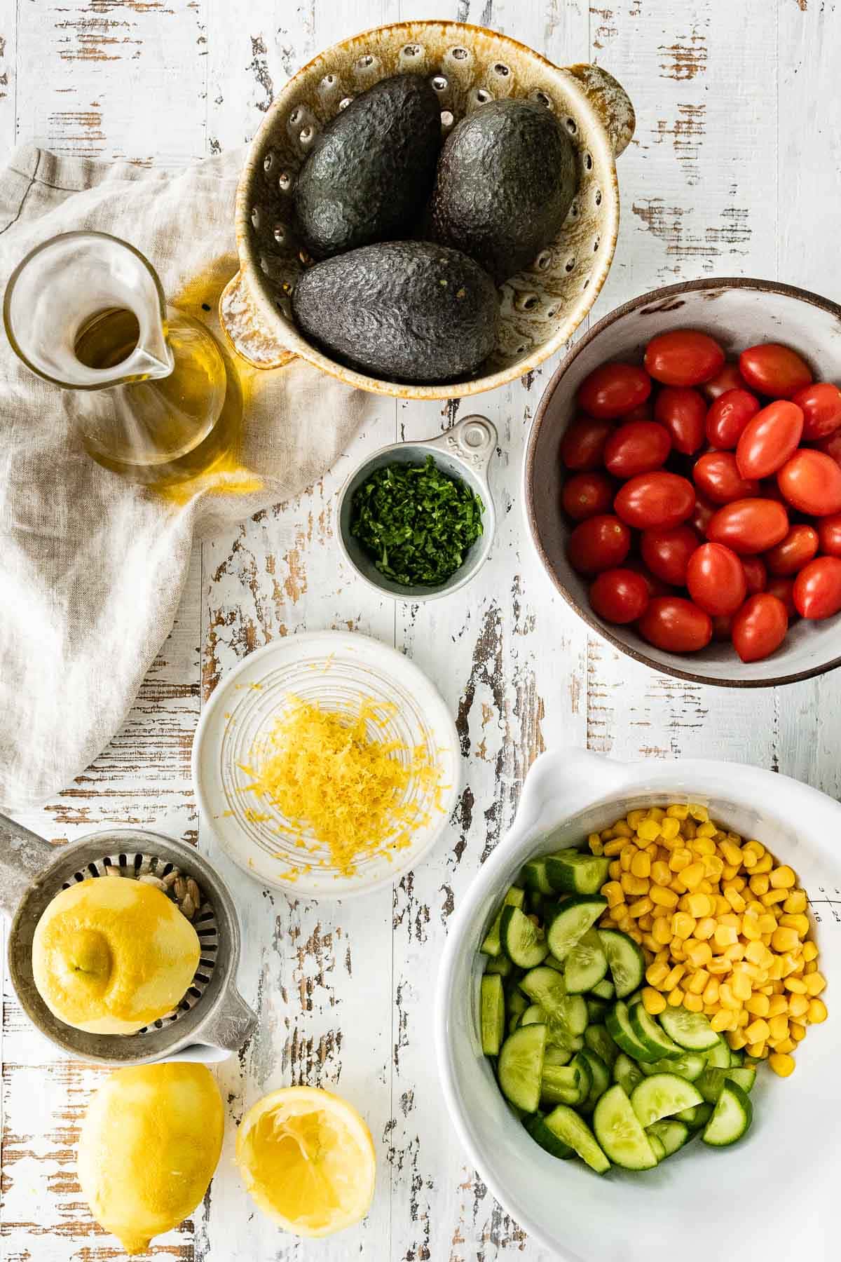 Ingredients for Avocado Tomato Corn Salad in prep bowls