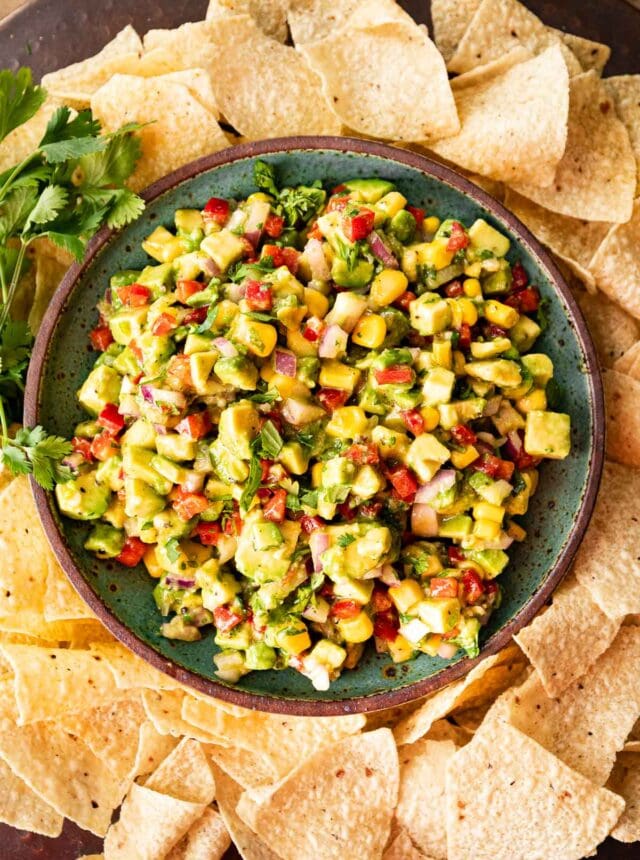Avocado Salsa in serving bowl with tortilla chips