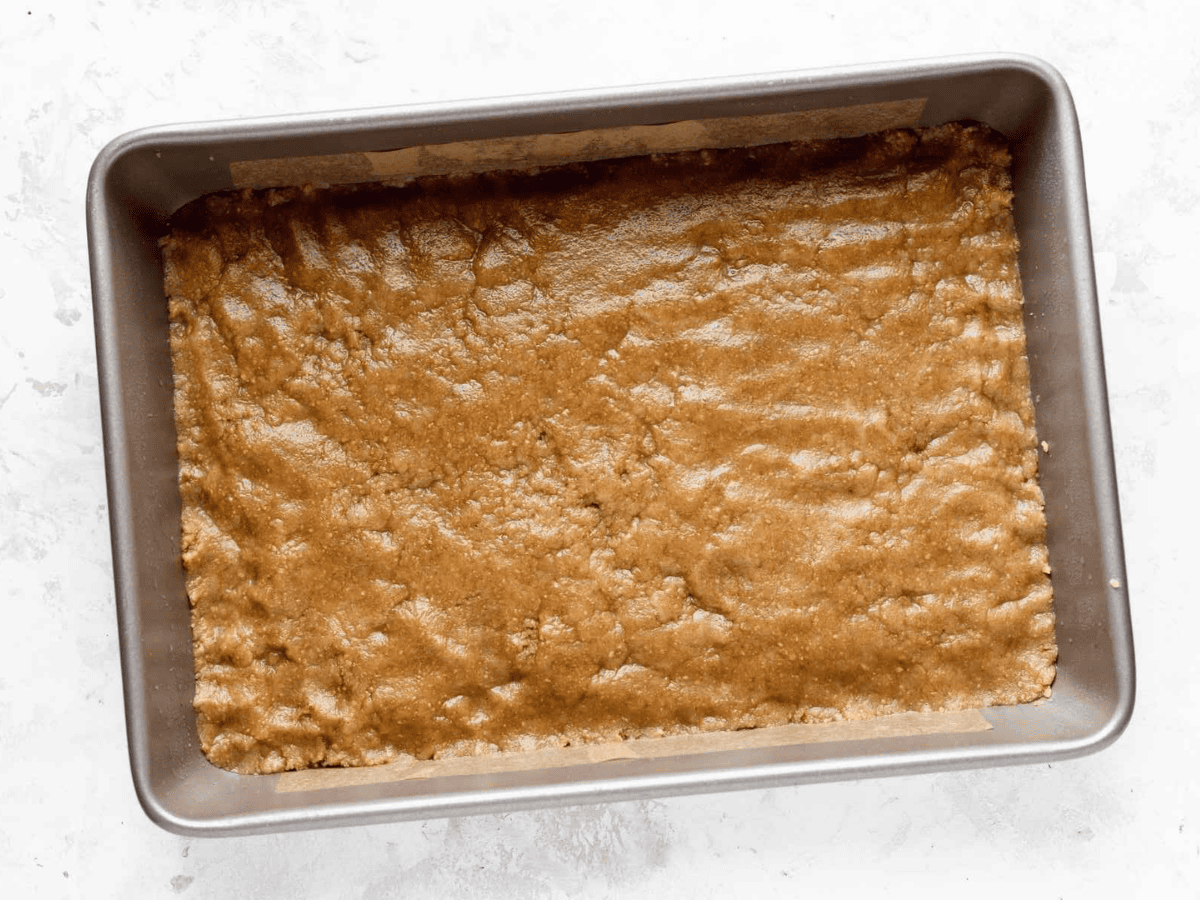 baked crust in a rectangular baking sheet
