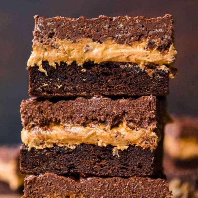 Peanut butter brownie squares stacked