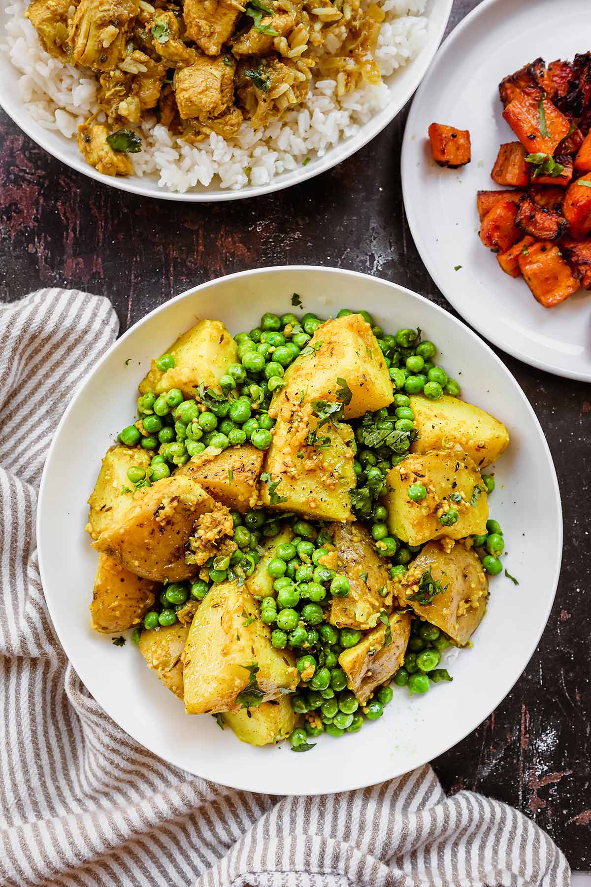 Indian Bombay Potatoes and Peas in serving bowl