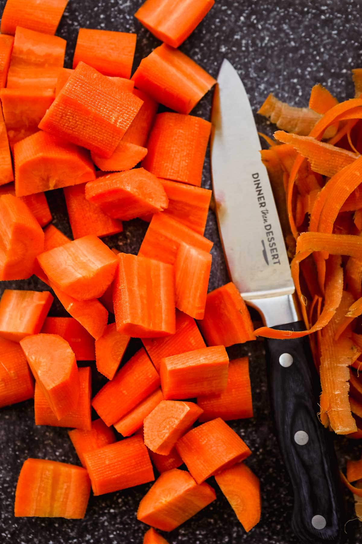 Indian Spiced Honey Roasted Carrots chopped carrots with knife