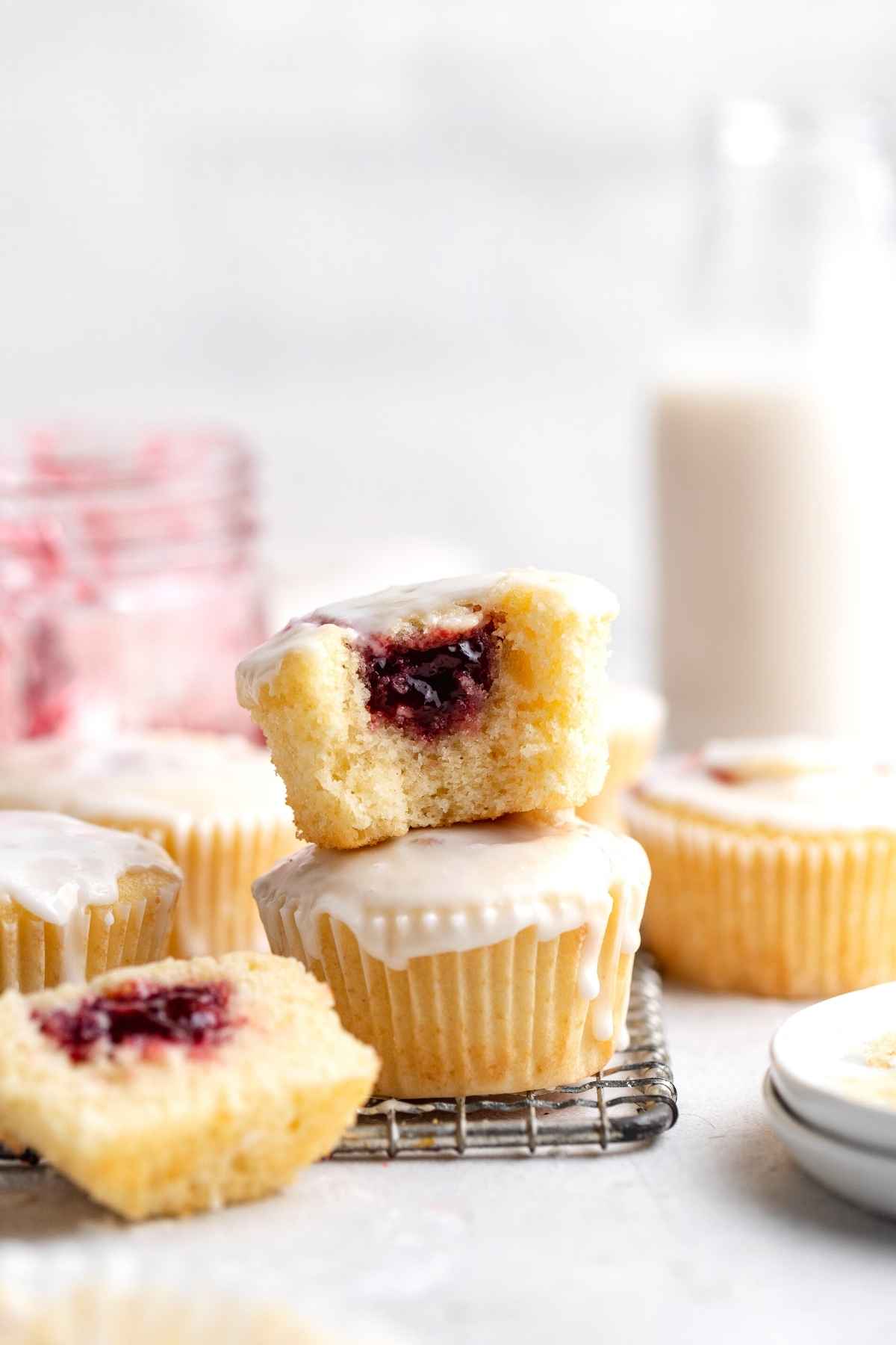 Jelly Doughnut Muffins on wire rack with bite taken