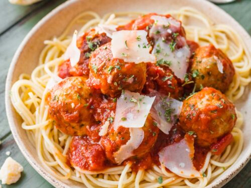 turkey meatballs in a bowl of spaghetti and marinara