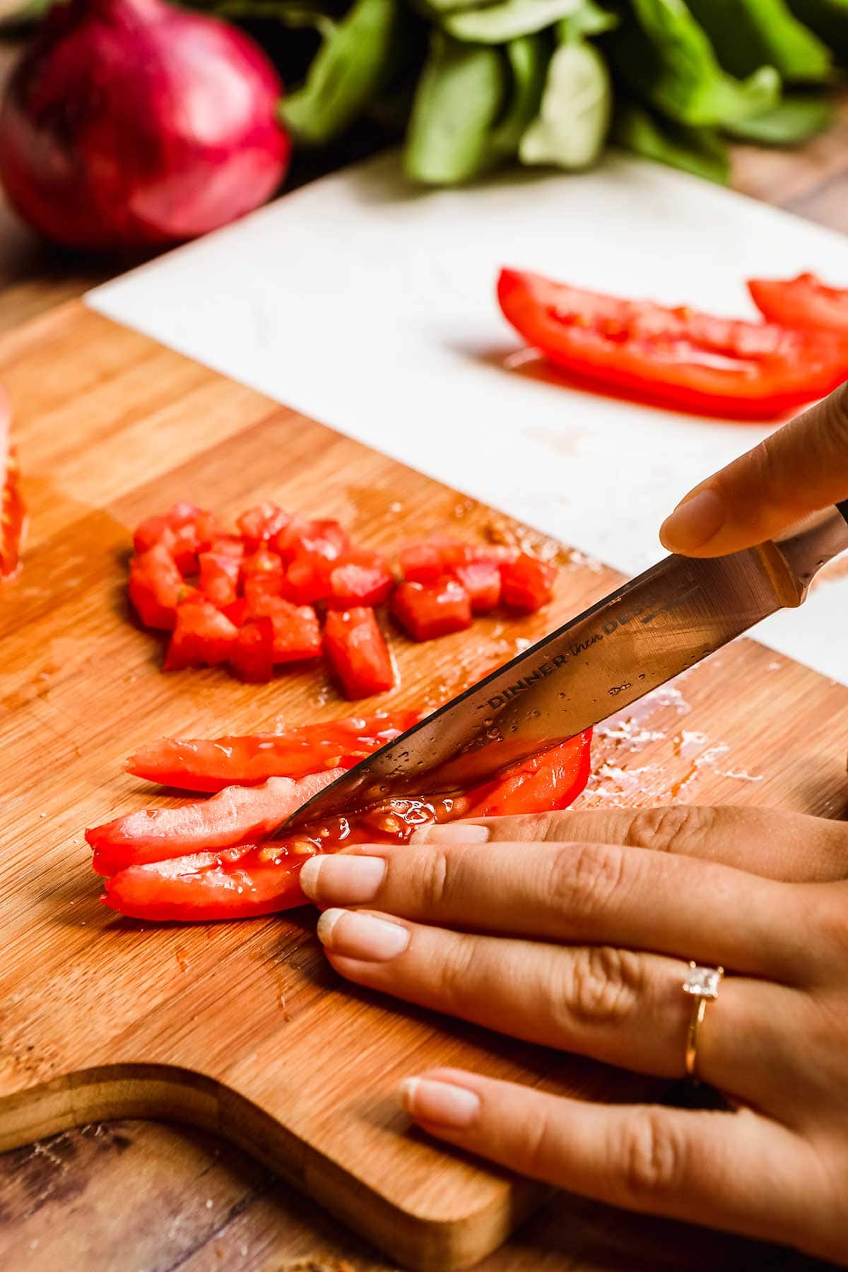 Balsamic Bruschetta slicing tomatoes