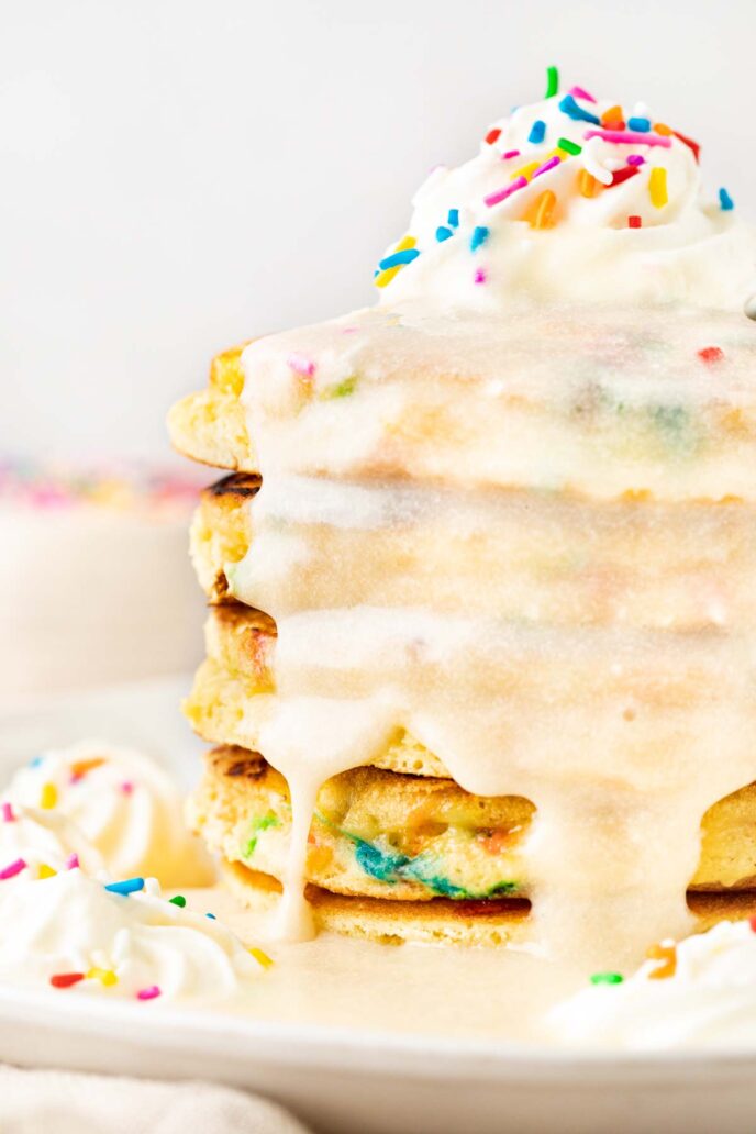 Birthday Cake Pancakes up close with vanilla glaze