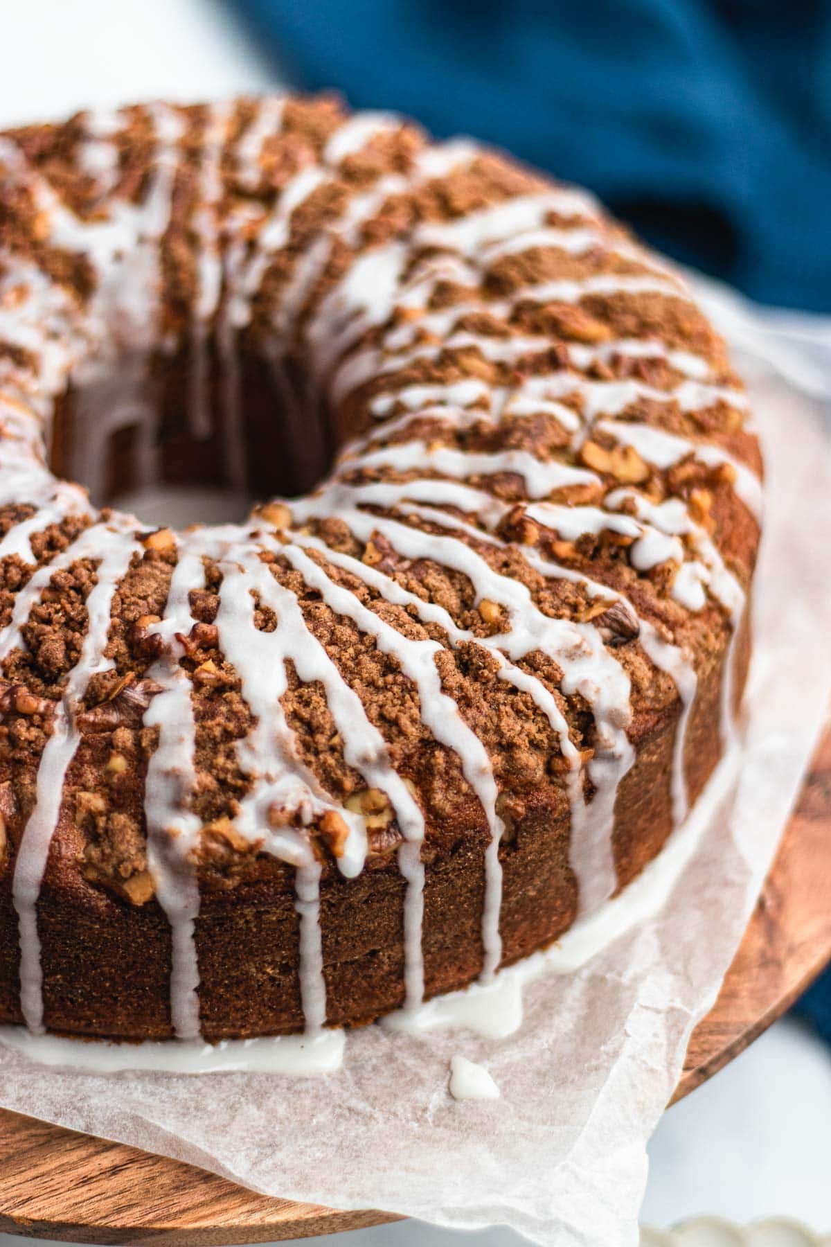 Bundt Coffee Cake on serving stand with icing drizzle