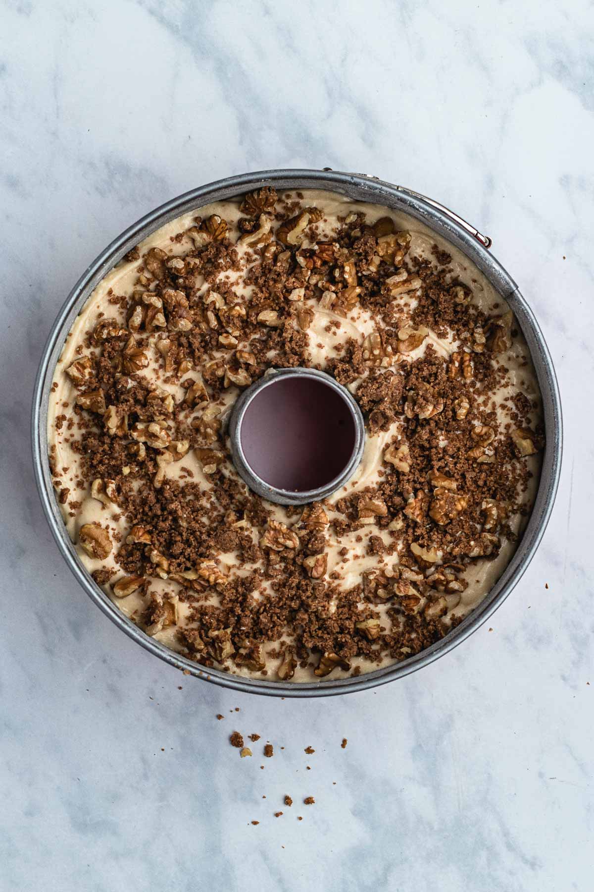 Bundt Coffee Cake batter and streusel in baking pan