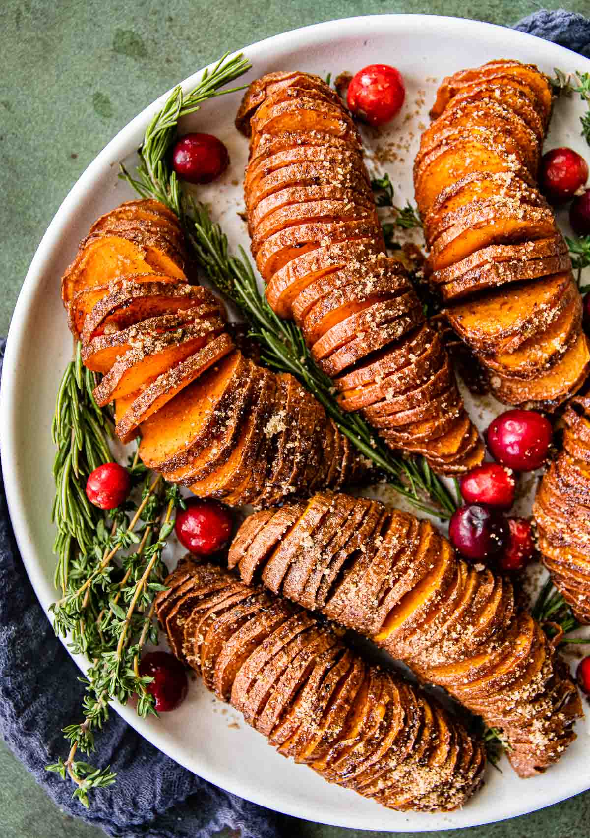 Candied Hasselback Sweet Potatoes on serving platter