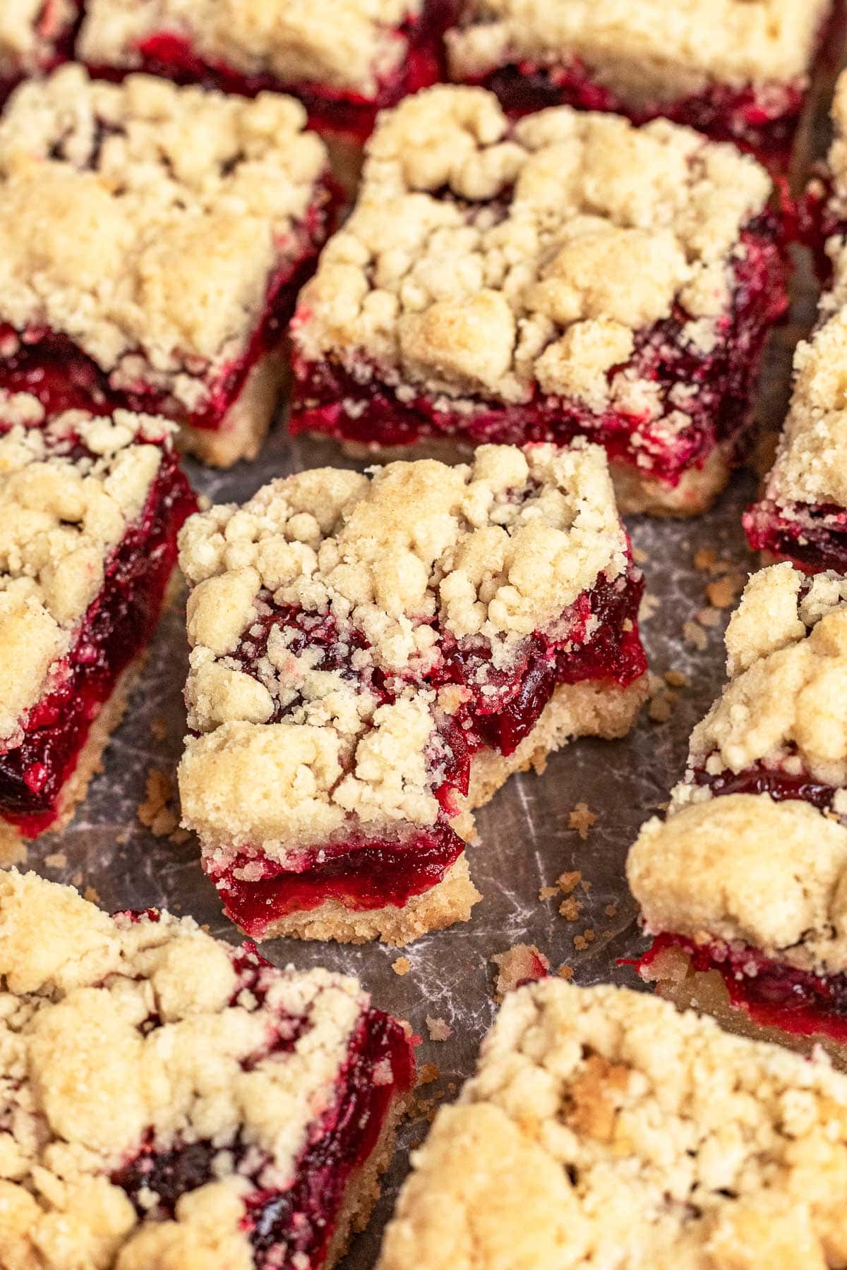 Cranberry Bars cut with inside view on serving platter