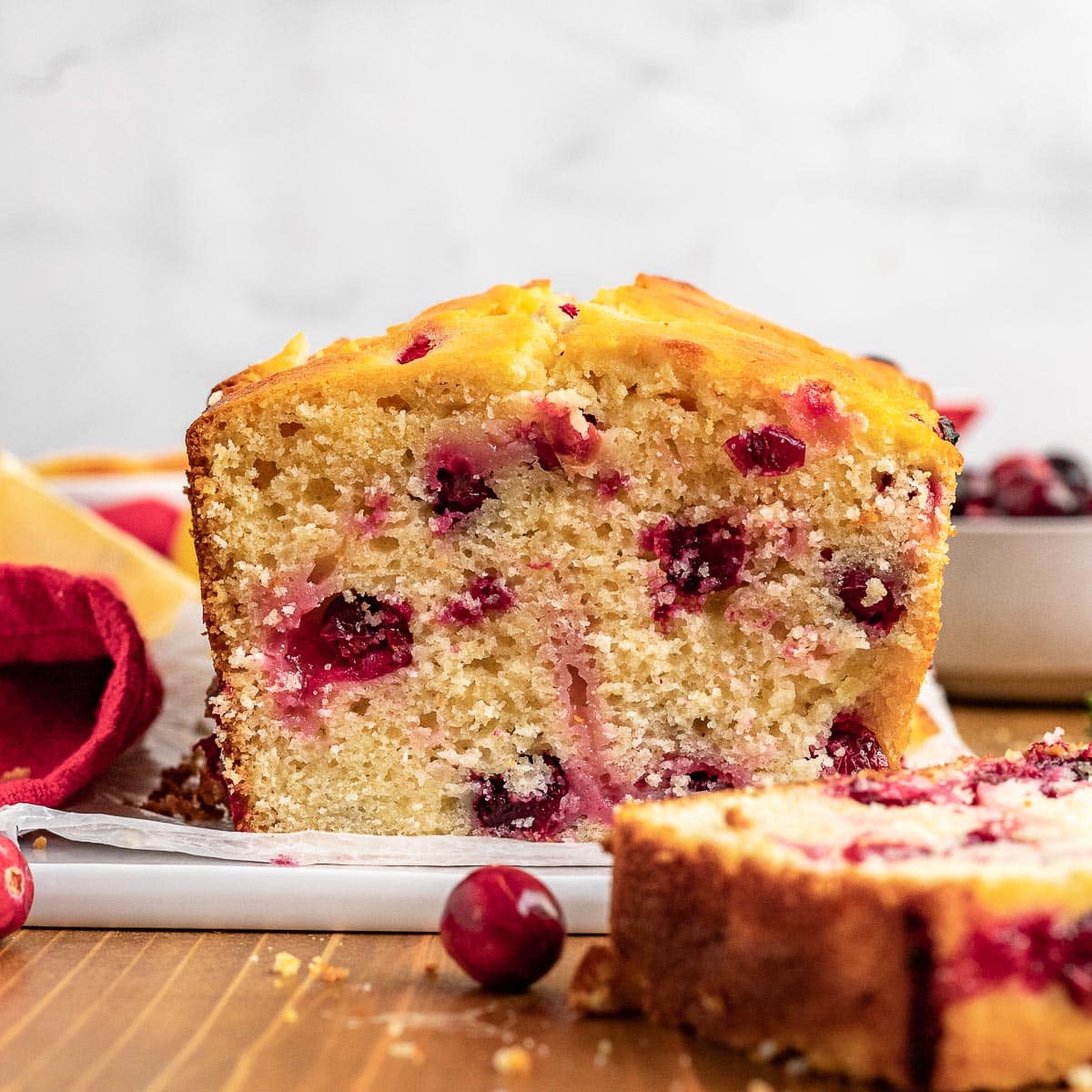 Cranberry Lemon Bread sliced on board