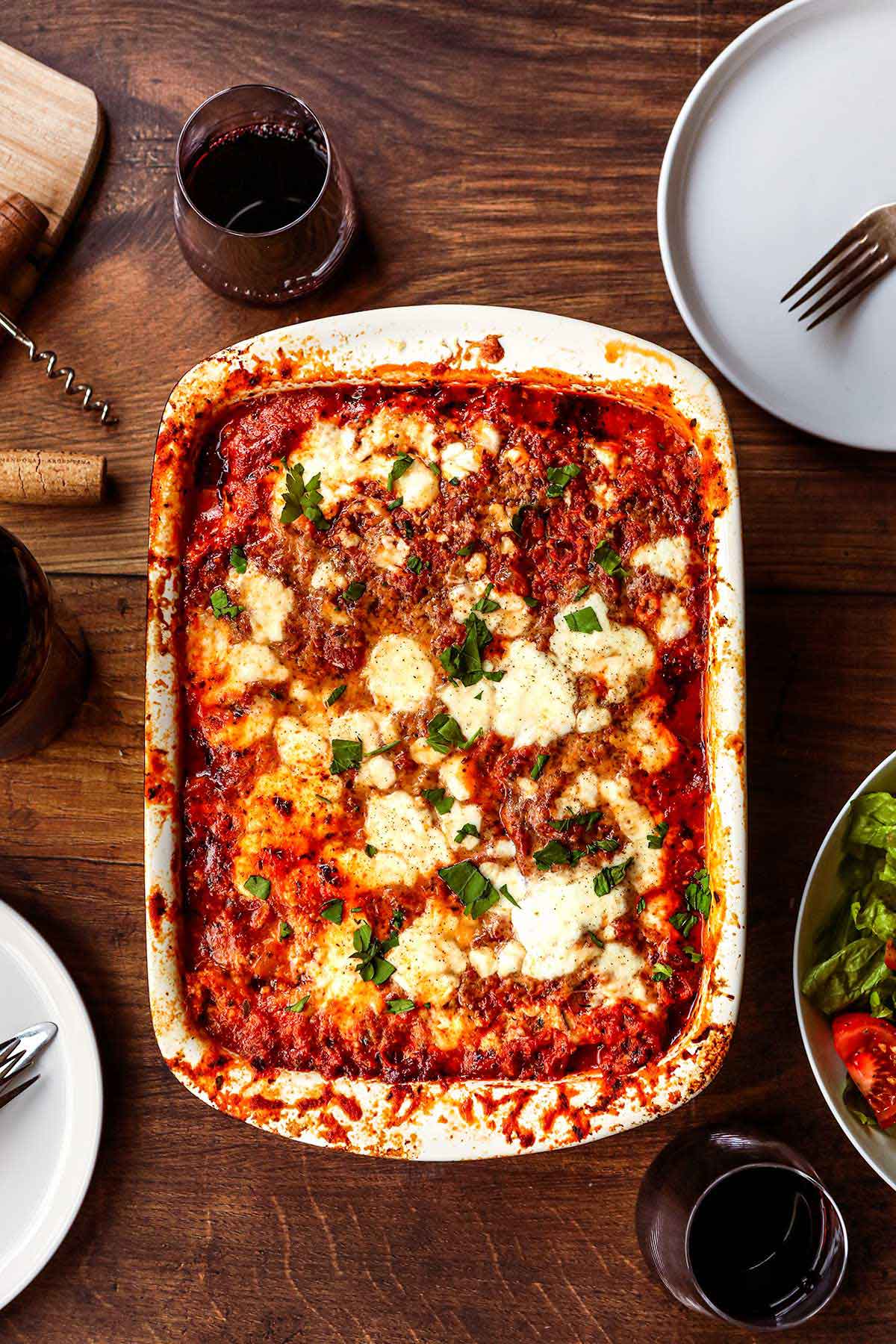 Eggplant Bake in baking dish with parsley garnish