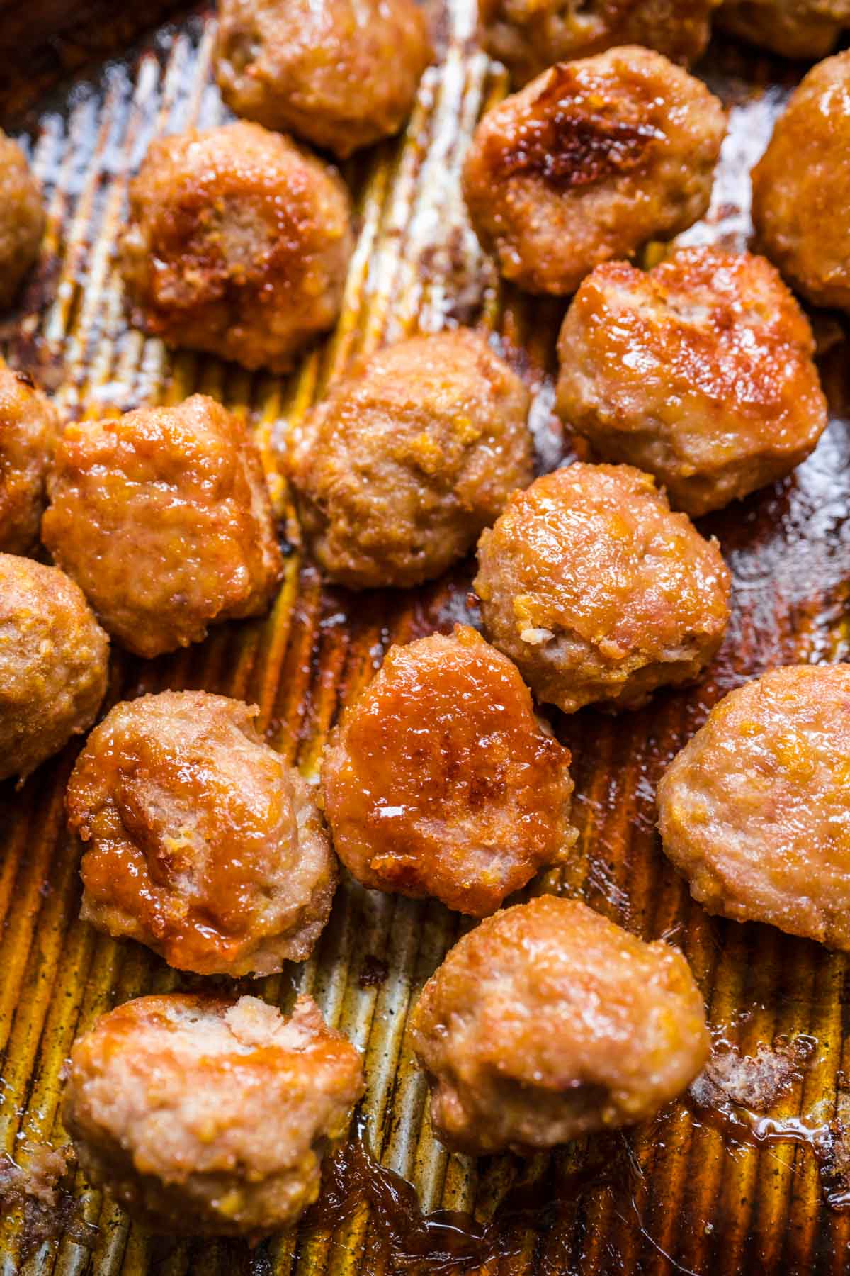 Ham Balls with Brown Sugar Glaze meatballs on baking sheet cooked