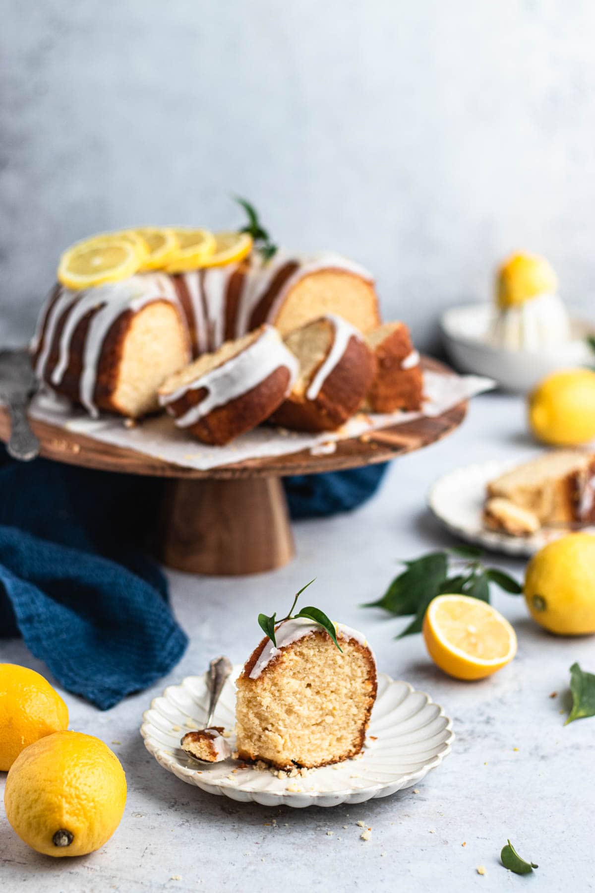 Lemon Bundt Cake on serving stand sliced
