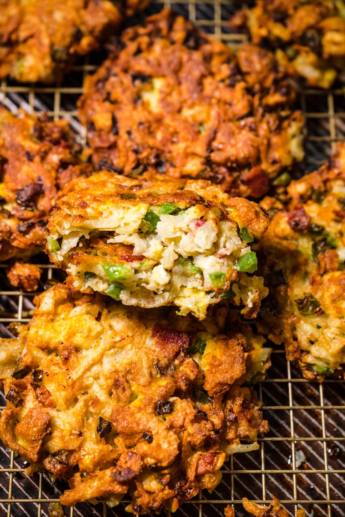 Loaded Breakfast Potato Pancakes after frying on wire rack