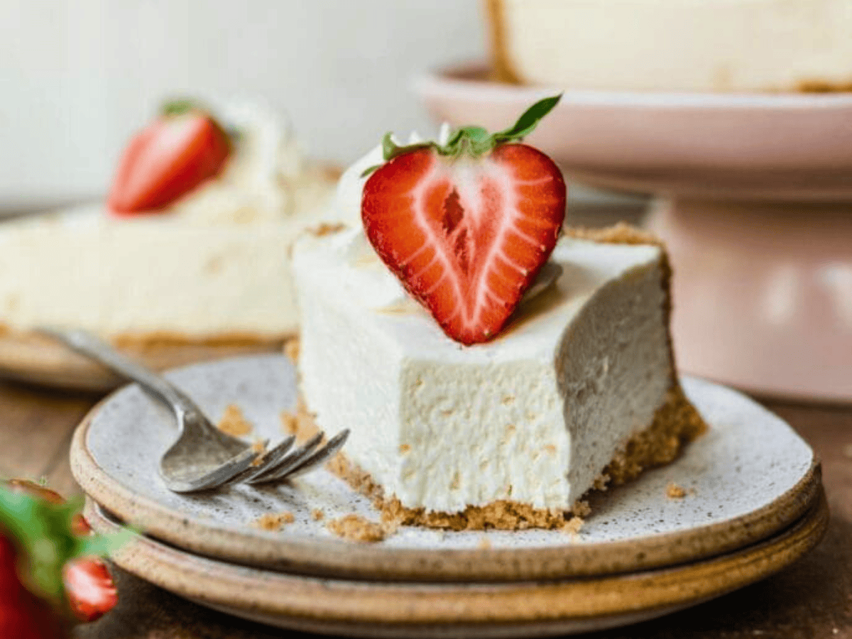 Slice of cheesecake with bite taken out