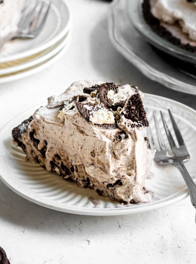 Oreo Ice Cream Pie slice on plate with fork