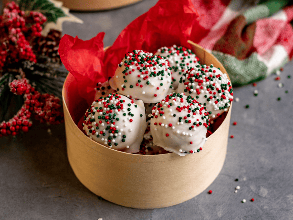 Closeup of desserts in a gift box with sprinkles