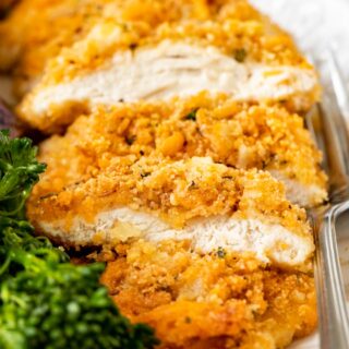 crispy chicken sliced on a plate 4x3