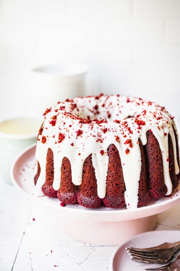 Red Velvet Bundt Cake Frosted with Cake Crumbs
