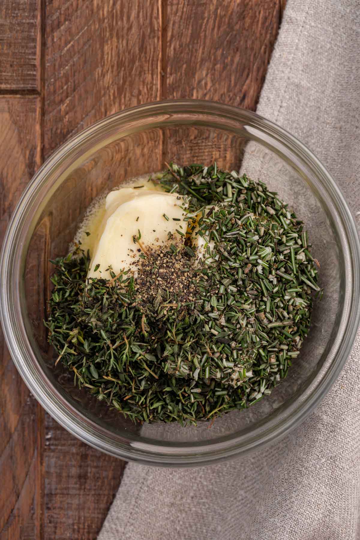 bowl of ingredients for herb butter