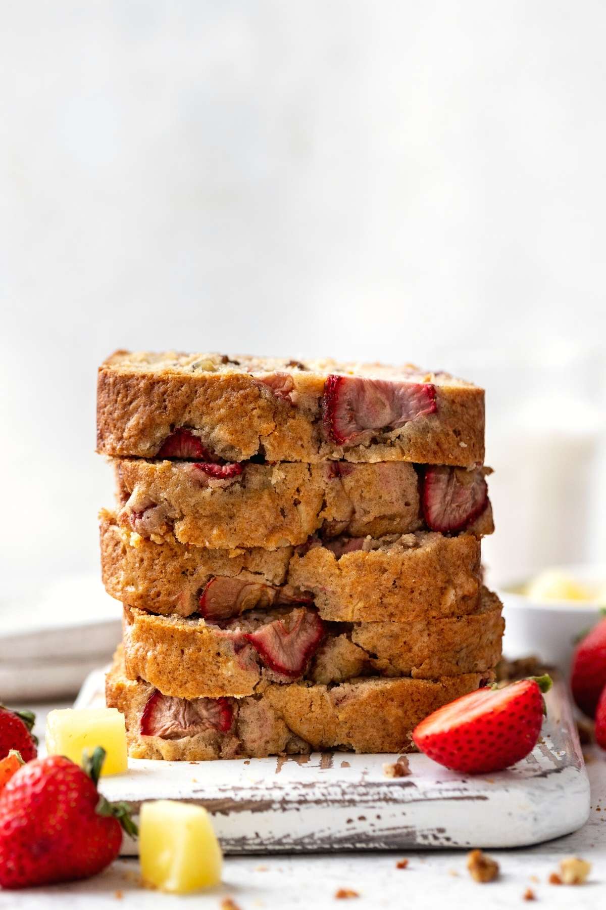 Strawberry Pineapple Bread stacked on serving platter