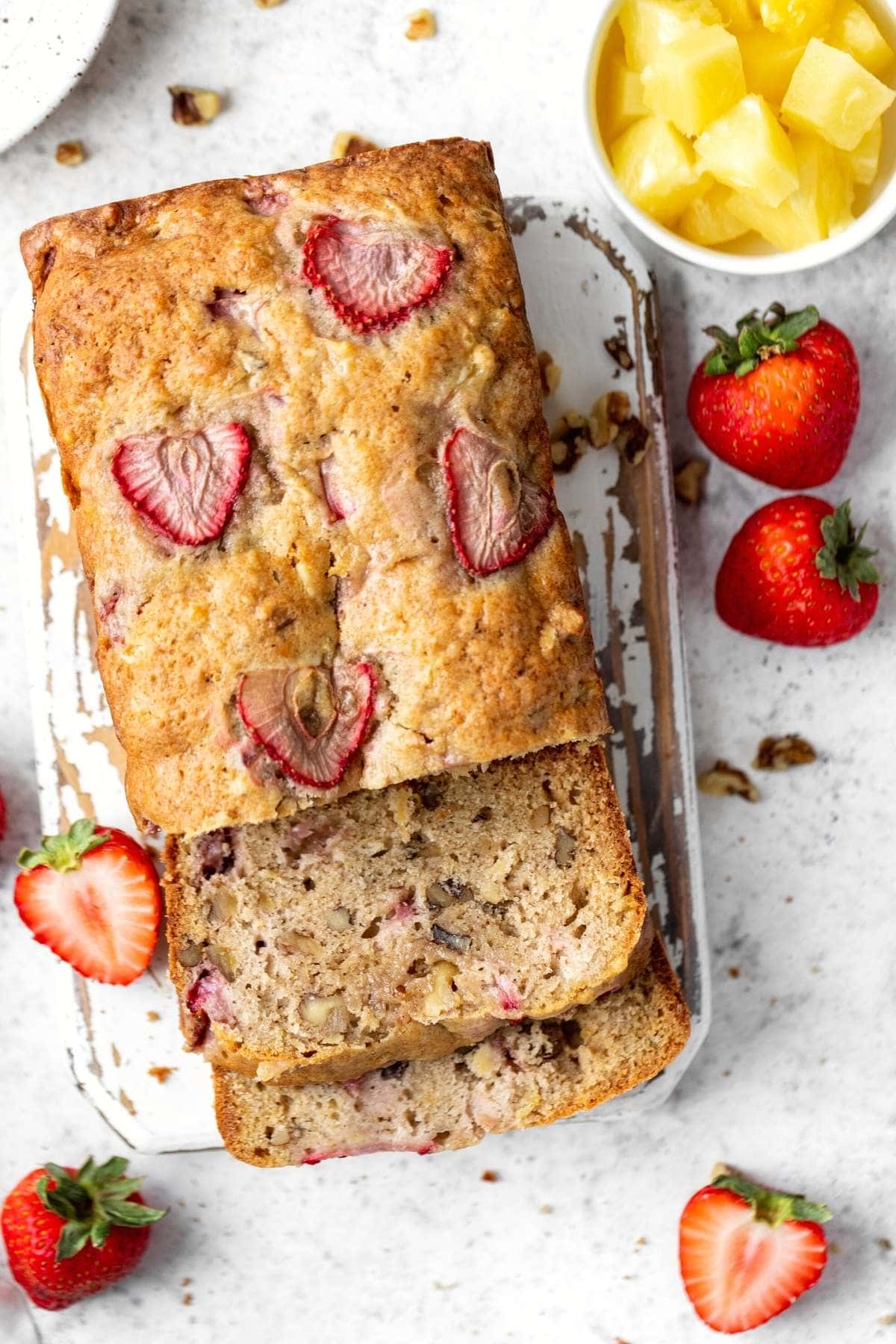 Strawberry Pineapple Bread sliced on serving platter