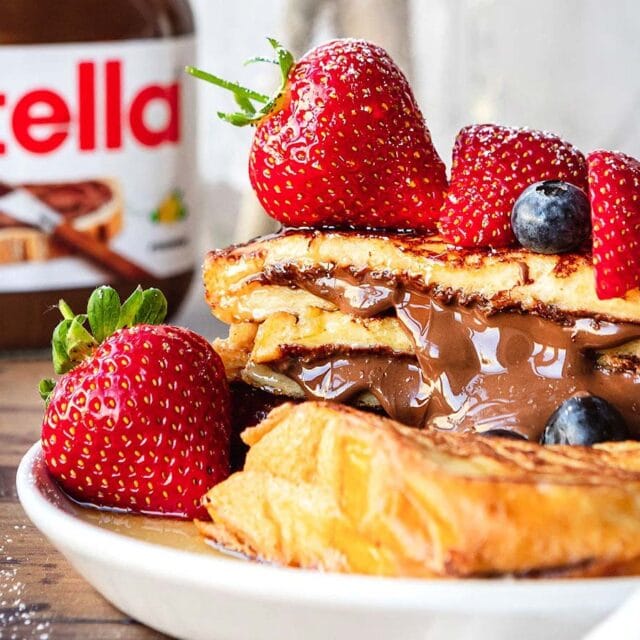 French Toast with Strawberries and a jar of Nutella
