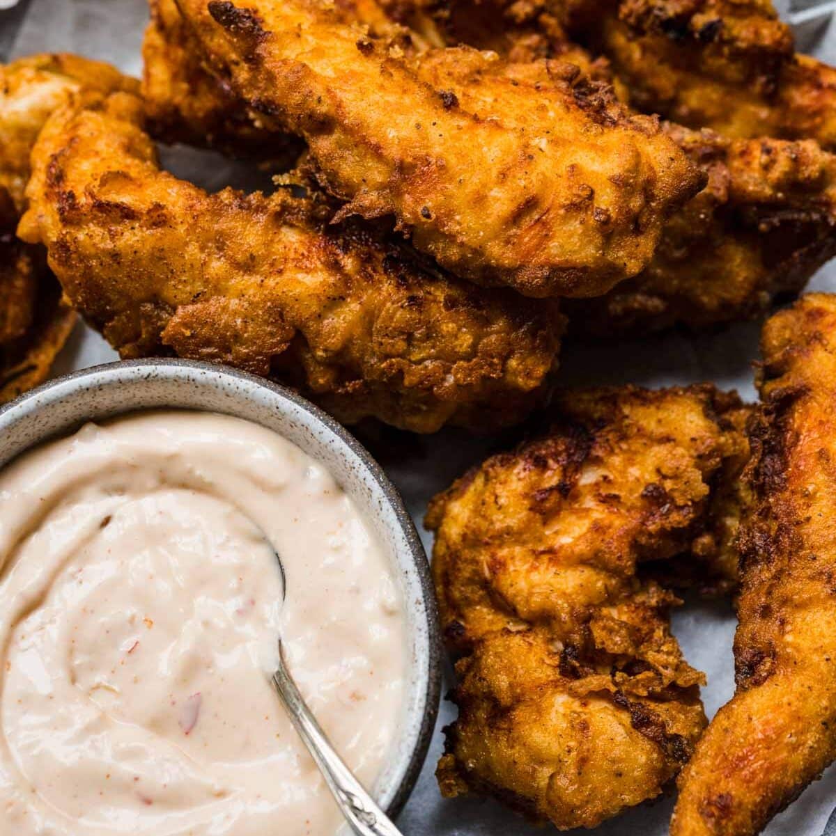 Texas Roadhouse Cajun Horseradish Sauce on serving plate with chicken critters