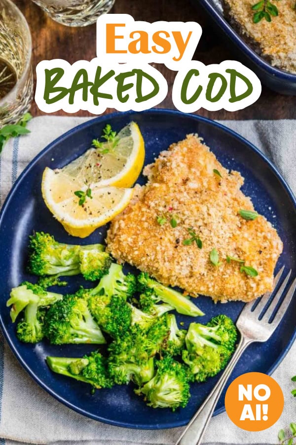 Cod plated with lemon wedges for garnish and steamed broccoli.