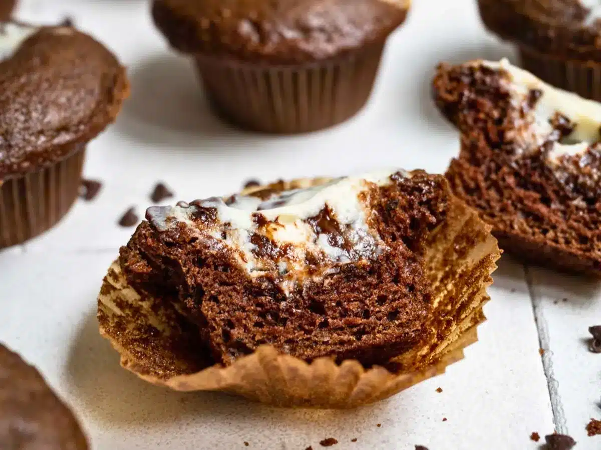 bitten chocolate dessert circle with cream in the middle