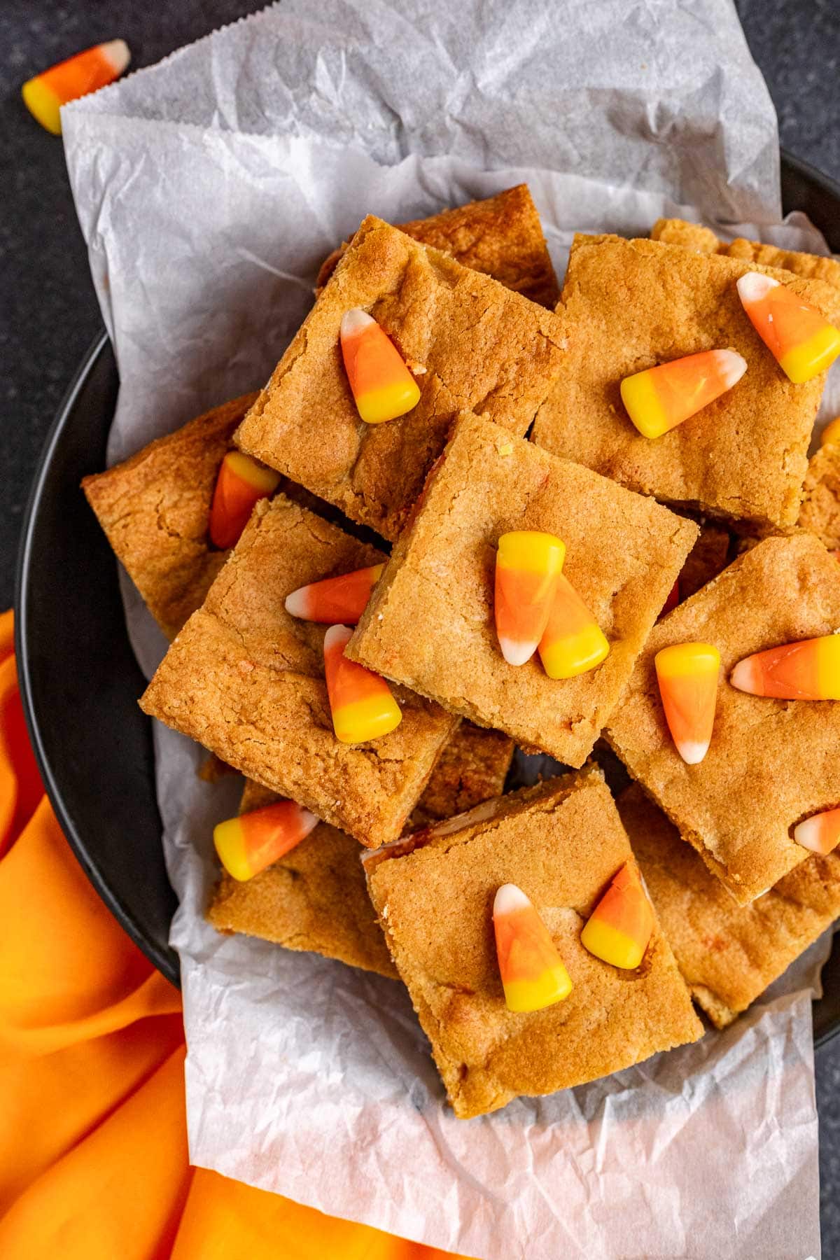 Candy Corn Blondies cut in squares on plate