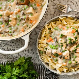 Finished chicken and sauce in pot and in bowl with noodles.