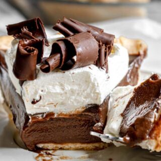 Slice of chocolate pie with a bite taken out