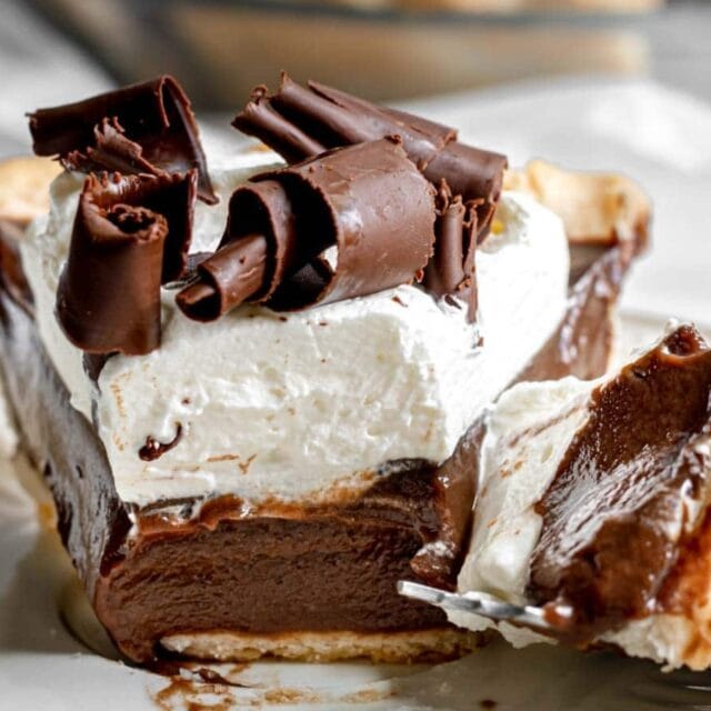 Slice of chocolate pie with a bite taken out